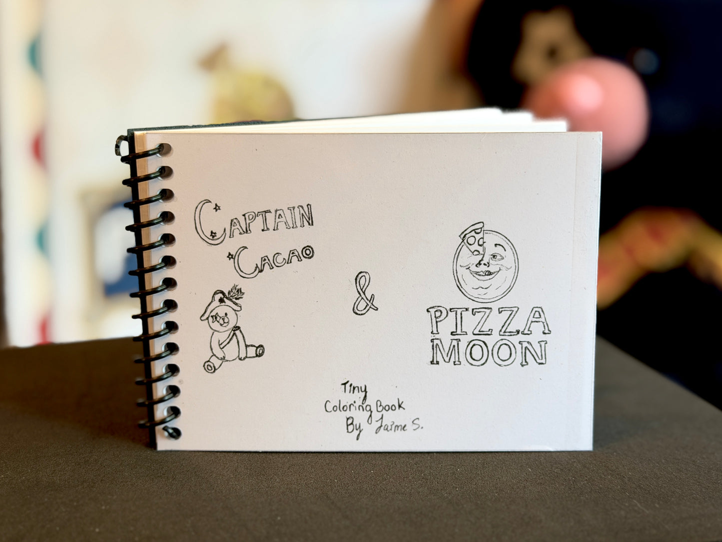 "Captain Cacao and Pizza Moon Tiny Coloring Book" by Jaime Tiny Themepark Art